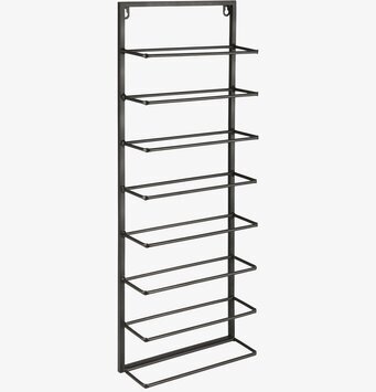 Foto av svart väggmonterat vinställ i modern design