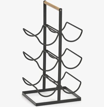 Bild av stilrent och modernt vinställ i svart och natur