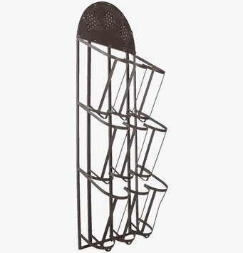Bild av väggmonterad vinhylla i järn med druvdetaljer