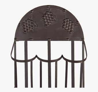 Bild av väggmonterat vinställ i järn med druvdetaljer